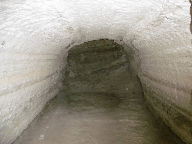 Cave house interior in Benamaurel, Granada, showcasing unique underground living space.