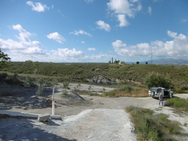 Cave house located in Benamaurel, Granada, with scenic views and rural surroundings.