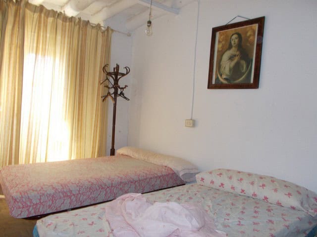 Charming town house interior in Seron, Almeria, with simple furnishings and natural light.