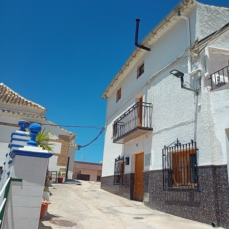 Charming village house in Hinojares, Jaen with traditional architecture and scenic surroundings.