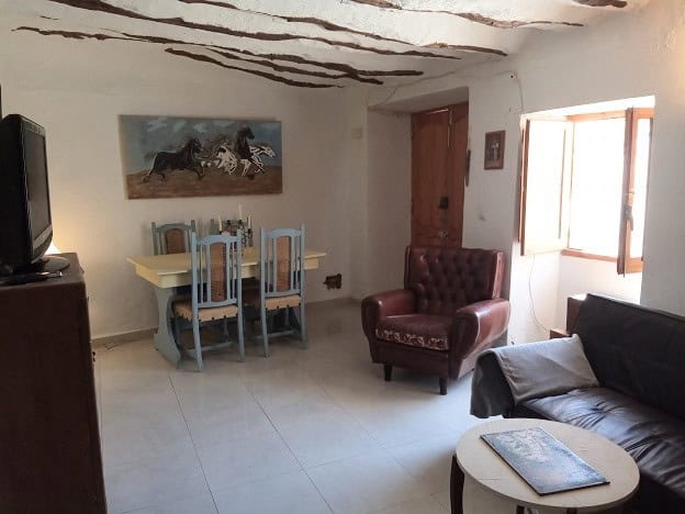 Charming interior of a village property in Hinojares, Jaen, featuring rustic decor and comfortable l.