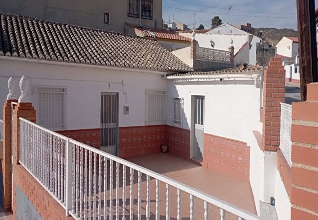 Village Property Terrace with views in Villanueva de las To, Granada, ideal for relaxing outdoor spa.