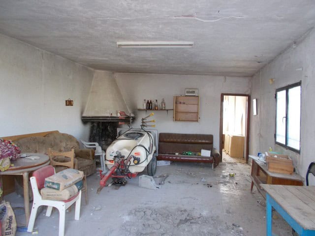 Charming interior of a rural property in Tijola, Almeria, with basic furnishings and a rustic atmosp.
