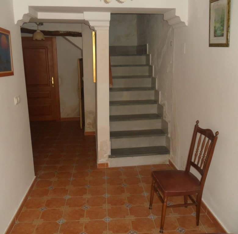 Village property in Cullar, Granada with traditional architecture and charming interior.