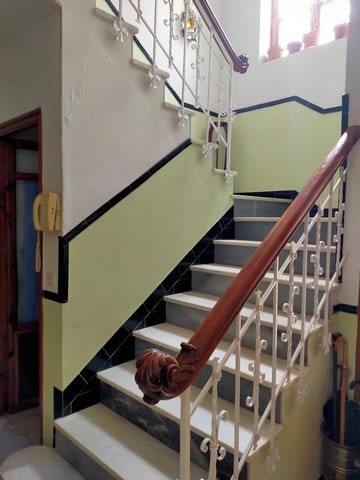 Town House Interior with Elegant Staircase in Cullar, Granada.