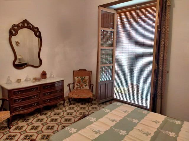 Town House in Cullar, Granada with traditional decor and cozy interiors.