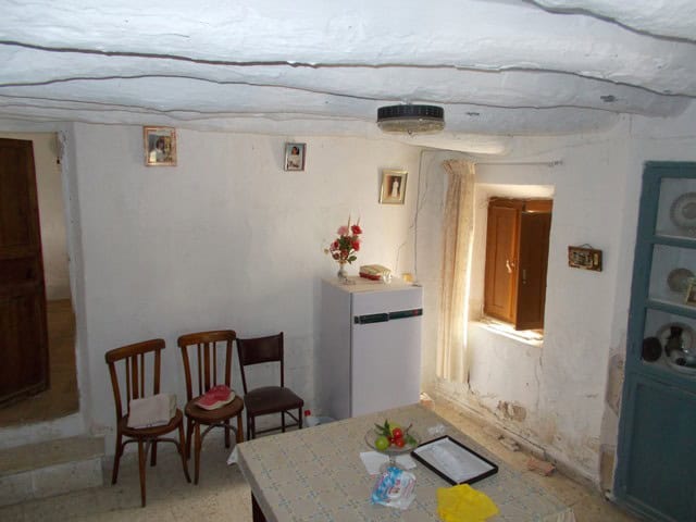 Rural property interior with rustic decor in Bayarque, Almeria, featuring vintage furniture and cozy.