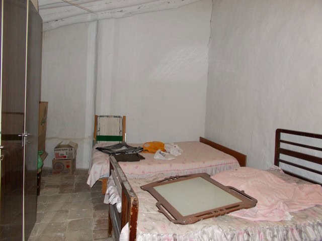 Charming rural property with two bedrooms in Bayarque, Almeria, featuring simple interiors and rusti.