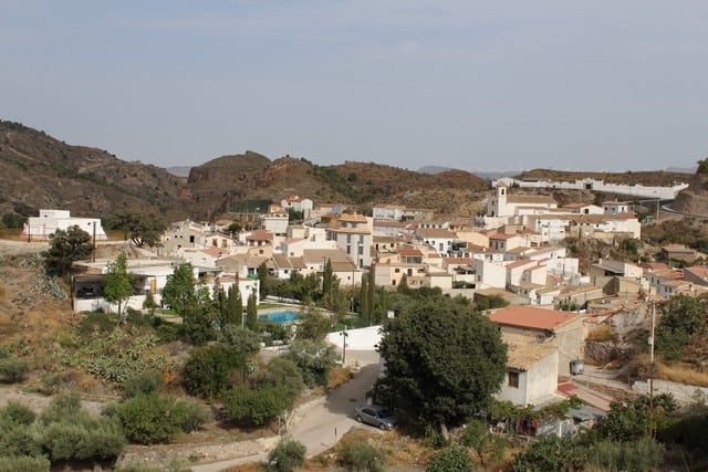 Rural property in Bayarque, Almeria, featuring traditional white houses and scenic mountain views.