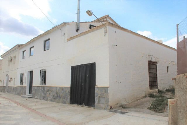 Charming village property in Cela, Almeria, with traditional whitewashed walls and rustic features.