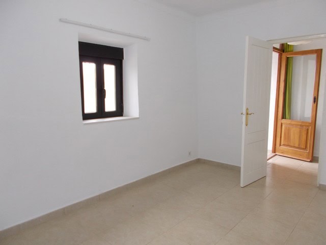 Village property interior with white walls and a window in Cela, Almeria.