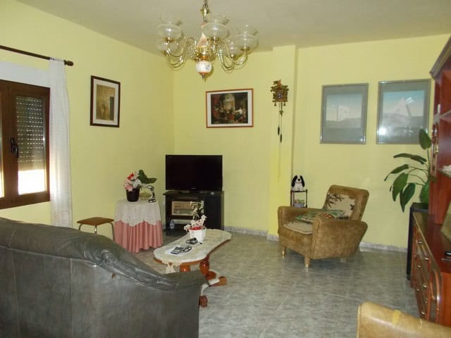 Cozy living room in a rural property located in Seron, Almeria, featuring traditional decor and comf.