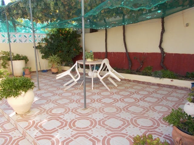 Charming outdoor patio with seating in Seron, Almeria, ideal for relaxing and enjoying the sunny cli.
