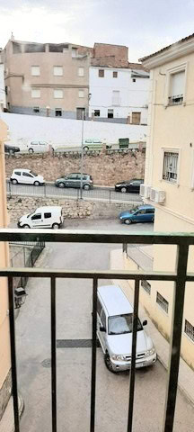 Cozy apartment view in Zujar, Granada, with parking and urban surroundings.