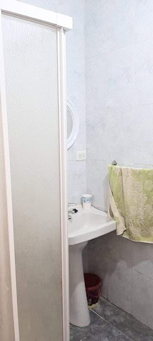 Bright bathroom with shower in Zujar, Granada property.