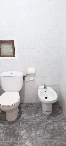 Bathroom with toilet and bidet in Zujar, Granada.