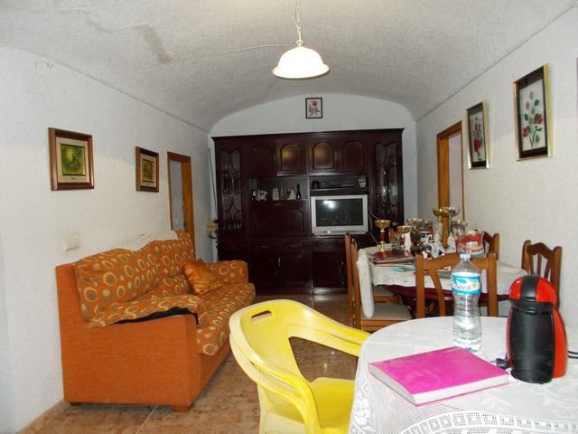 Charming cave house in Bacor, Granada, featuring traditional decor and modern amenities. Perfect for.