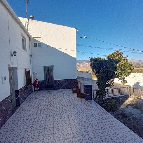 Charming village property in Fontanar, Jaen with a spacious outdoor terrace and scenic views.