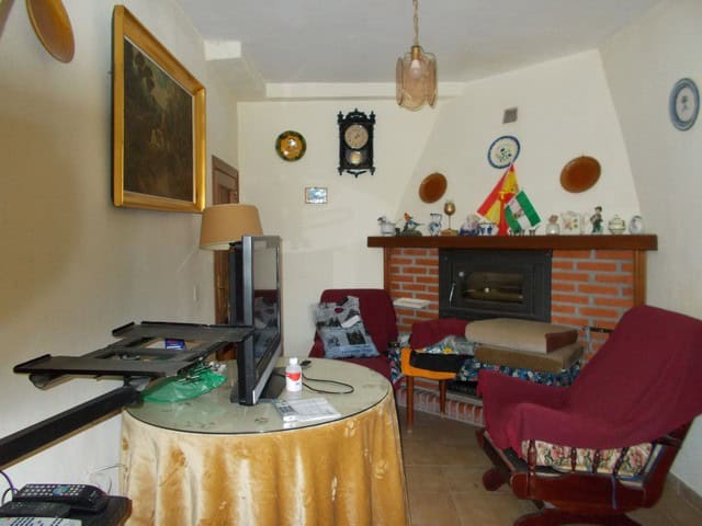 Charming living room of a rural property in Seron, Almeria, featuring traditional decor and cozy fur.