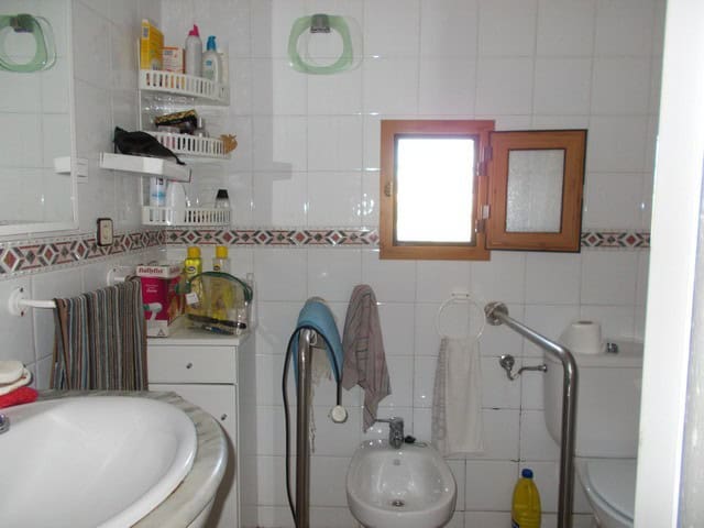 Charming rural home bathroom in Seron, Almeria with functional fixtures and natural light.