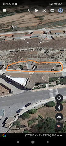 Town house for sale in Caniles, Granada, with spacious layout and rural surroundings.
