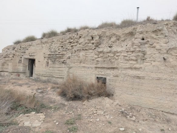 Cave house built into the natural rock formation in Benamaurel, Granada, offering unique living in a.