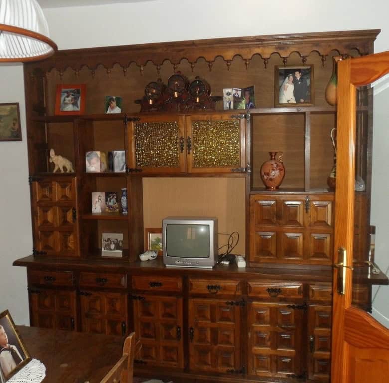 Charming village home in Campo Camara, Granada, featuring traditional wooden furniture and cozy deco.
