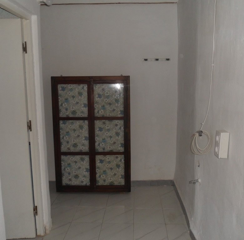 Village property interior with simple furnishings in Campo Camara, Granada.