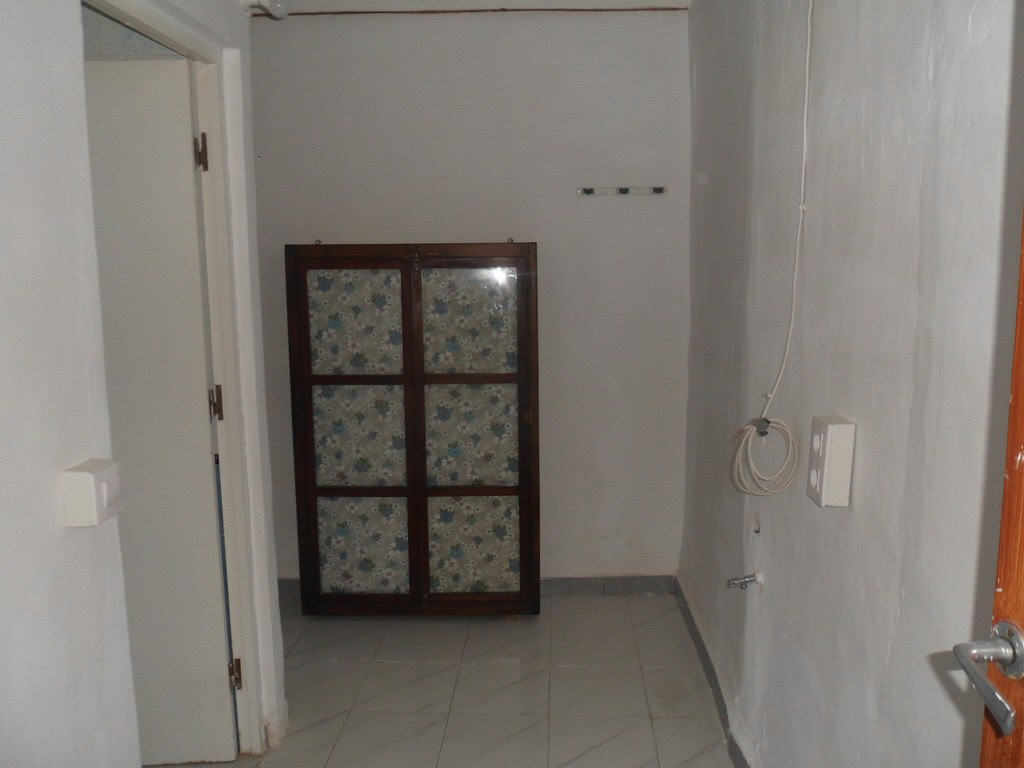 Village property interior with simple furnishings in Campo Camara, Granada.