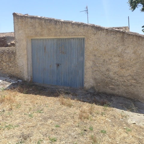 Garage door in a rustic village property in Chirivel, Almeria, Spain.