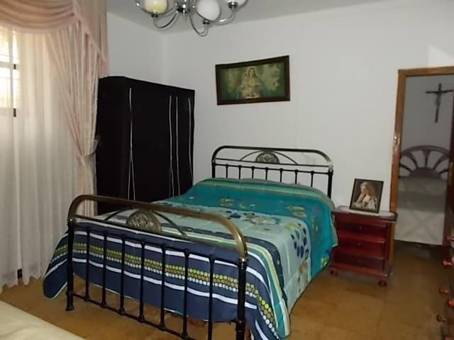 Charming bedroom in a rural property located in Seron, Almeria, featuring traditional decor and cozy.