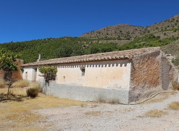 Rural property in Lucar, Almeria, featuring traditional architecture and scenic mountain views.