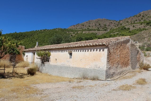 Rural property in Lucar, Almeria, featuring traditional architecture and scenic mountain views.