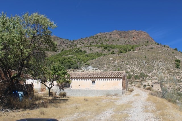 Traditional rural property in Lucar, Almeria, set in a scenic mountain landscape with natural surrou.