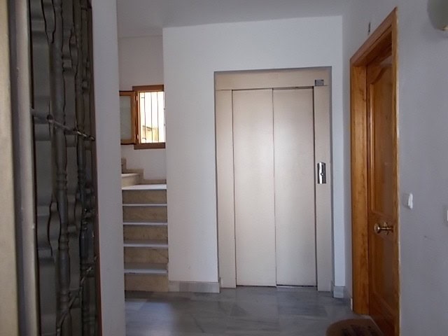 Elevator door inside apartment in Tijola, Almeria, Spain.