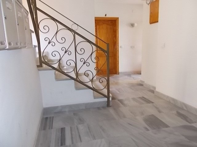 Apartment interior with staircase in Tijola, Almeria, Spain.
