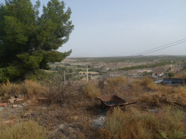 Cave house in Benamaurel, Granada, surrounded by natural landscape and rural scenery.