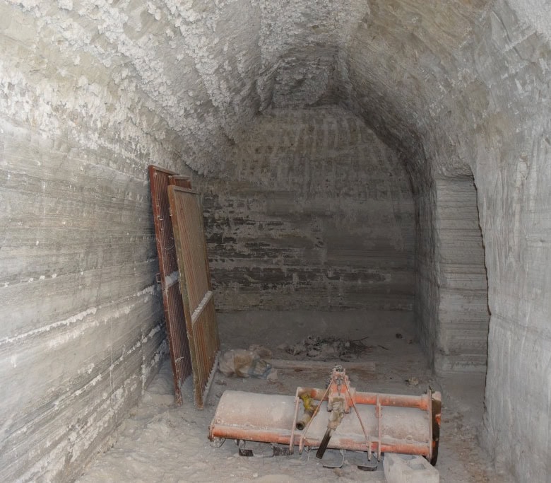Cave house interior in Benamaurel, Granada, showcasing traditional underground living space.