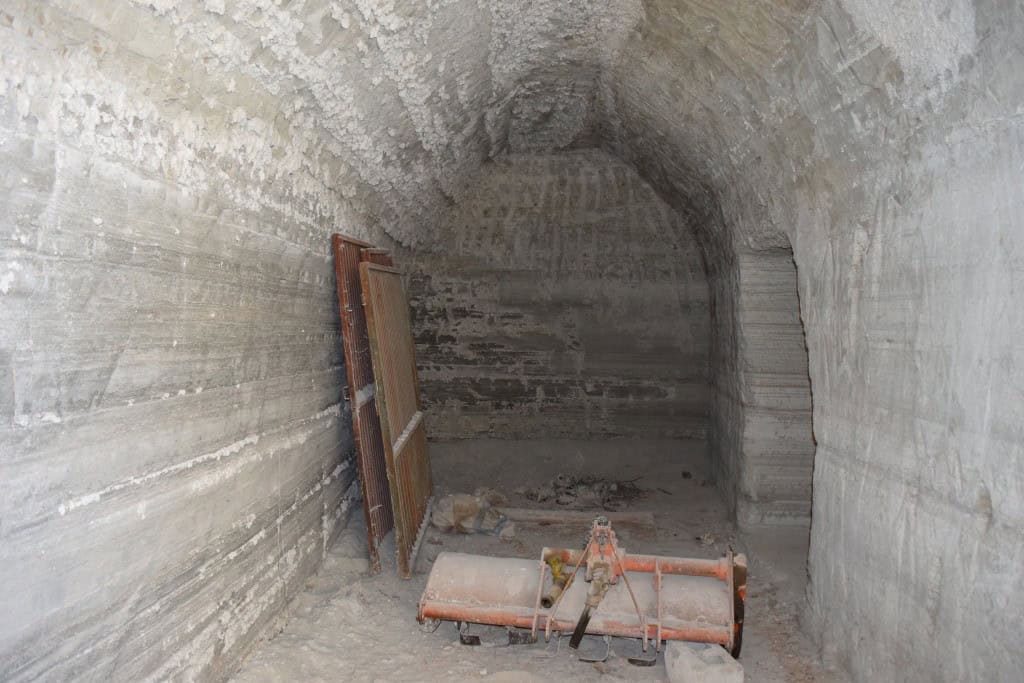 Cave house interior in Benamaurel, Granada, showcasing traditional underground living space.