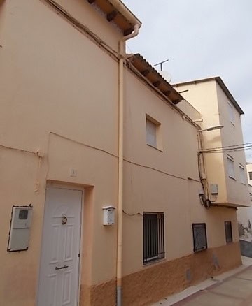 Charming town house in Tijola, Almeria, with traditional architecture and a cozy exterior.