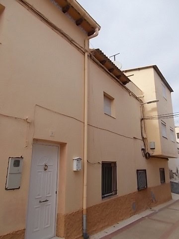Charming town house in Tijola, Almeria, with traditional architecture and a cozy exterior.