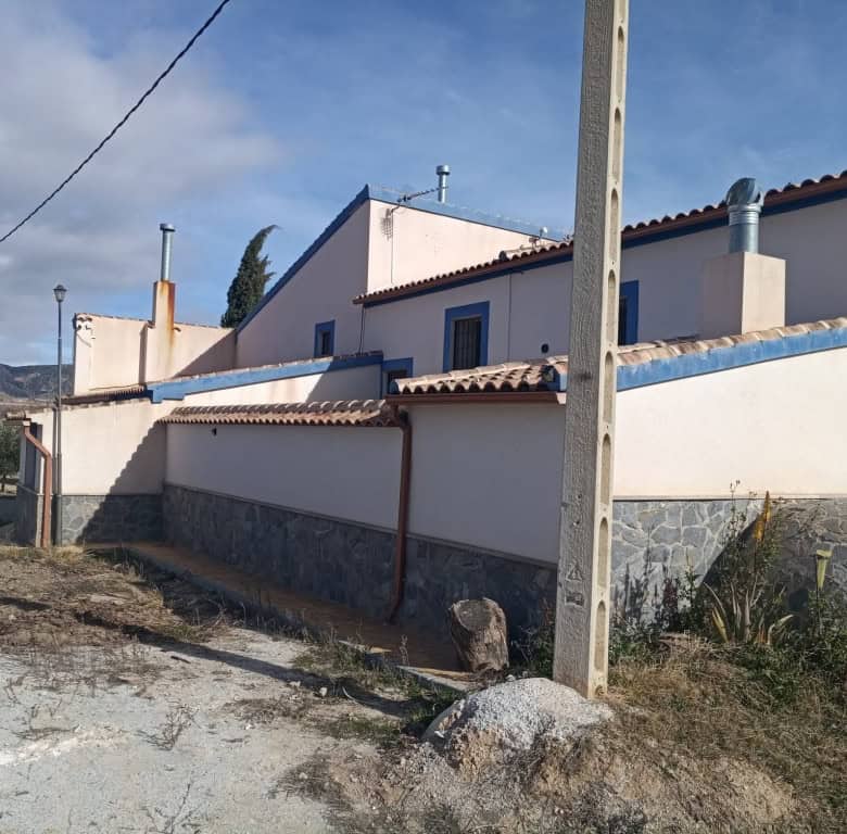 Commercial property for sale in Oria, Almeria, with traditional architecture and scenic surroundings.