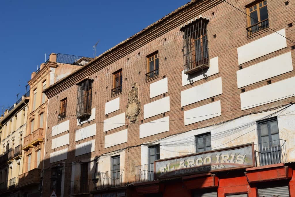 Town house for sale in Guadix, Granada with traditional architecture and charming balconies.