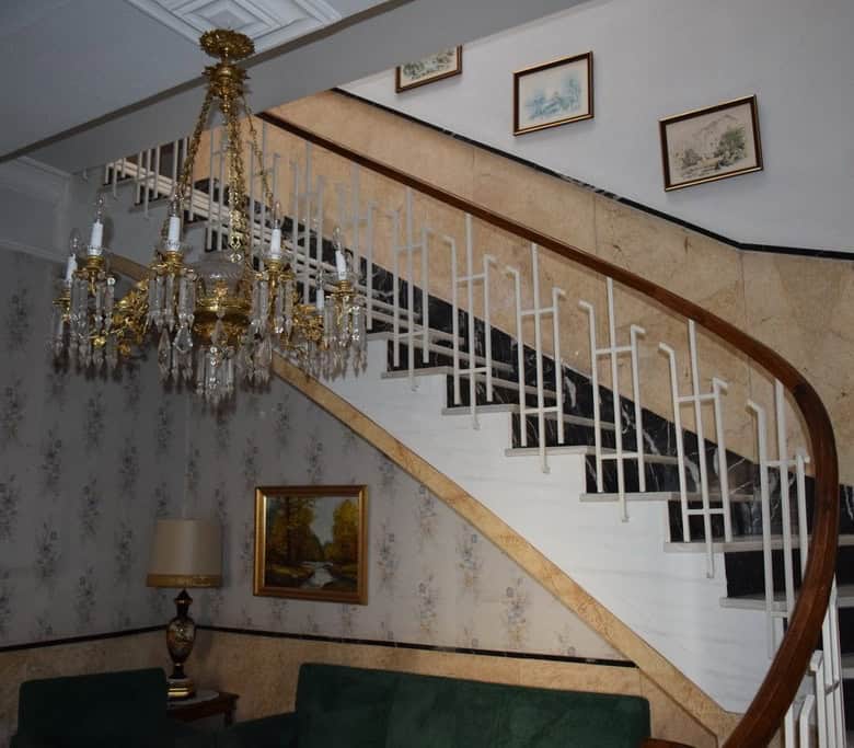 Town House Interior in Guadix, Granada with staircase and classic decor.