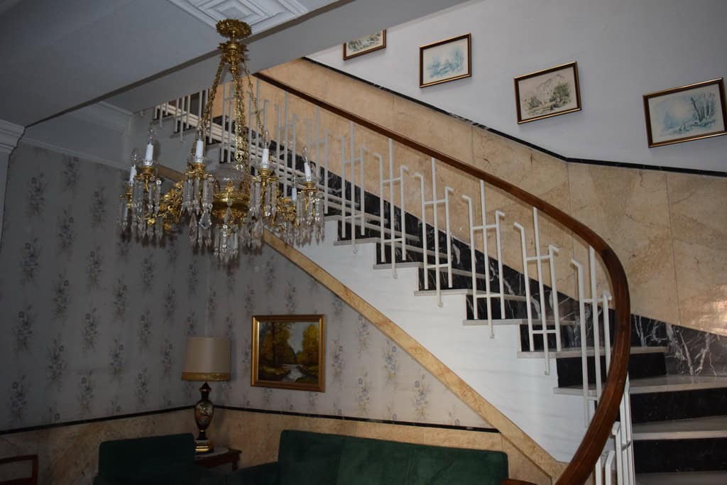 Town House Interior in Guadix, Granada with staircase and classic decor.