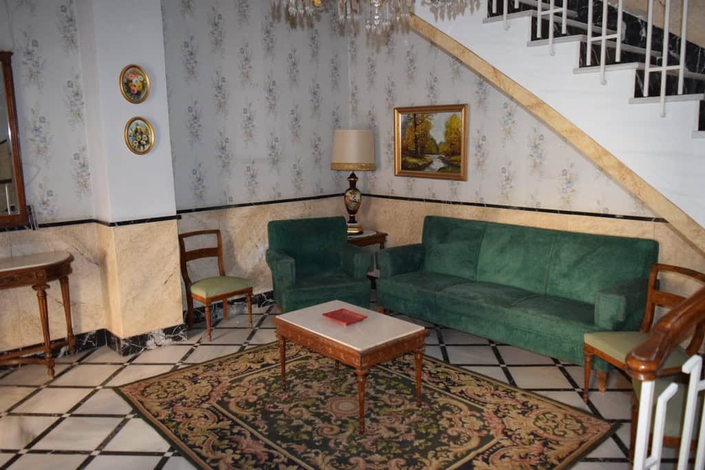 Town House interior in Guadix, Granada with vintage decor and classic furnishings.