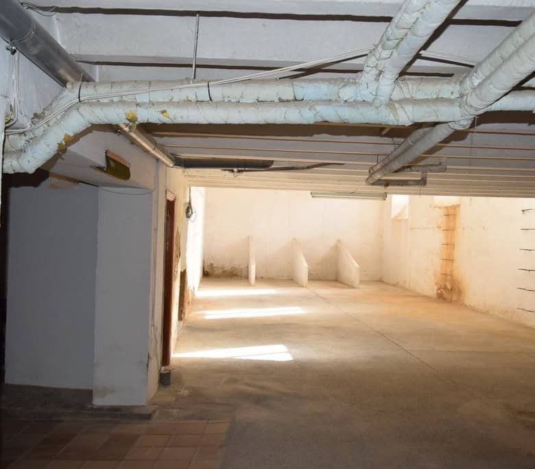 Spacious underground parking area in a town house located in Guadix, Granada.