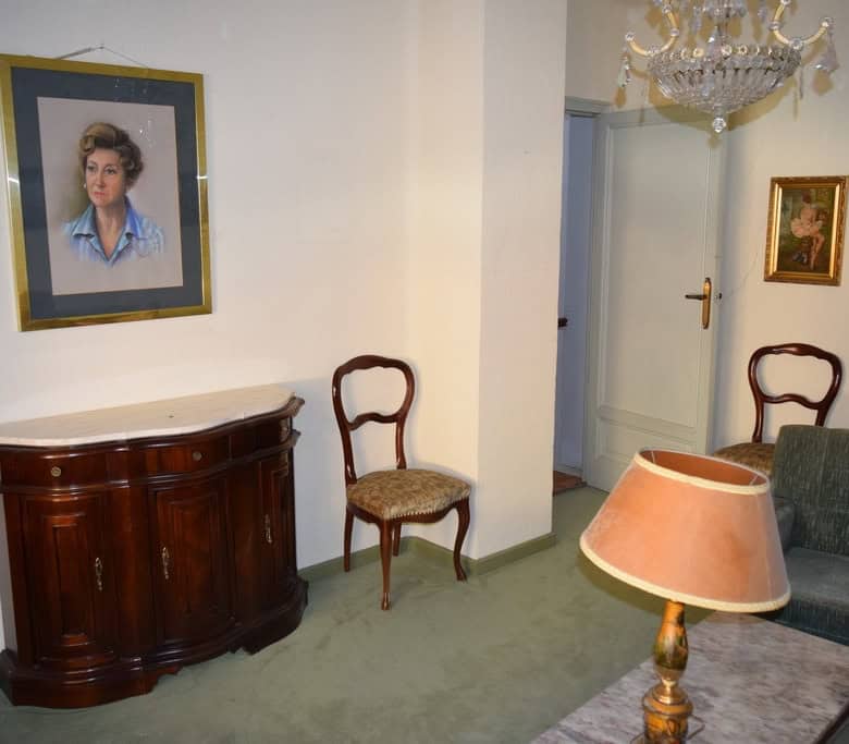 Interior view of a traditional town house in Guadix, Granada, showcasing vintage furniture and class.