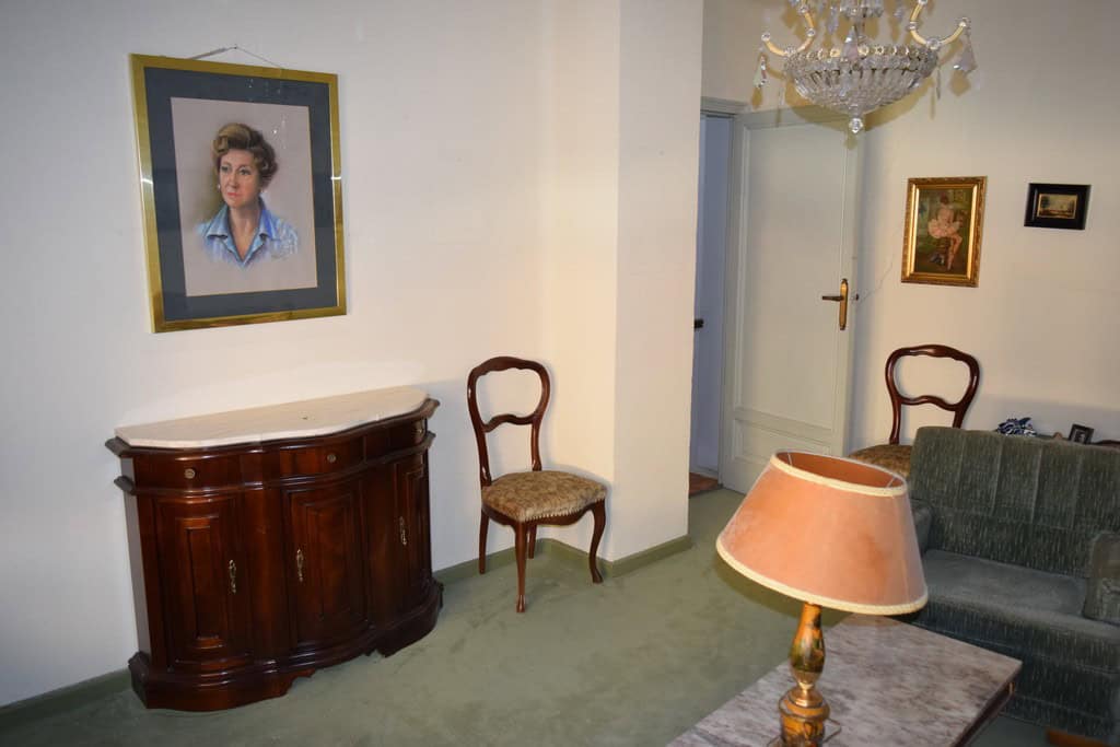 Interior view of a traditional town house in Guadix, Granada, showcasing vintage furniture and class.