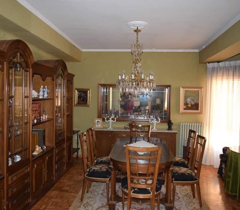 Town House interior in Guadix, Granada with classic furniture and chandelier.